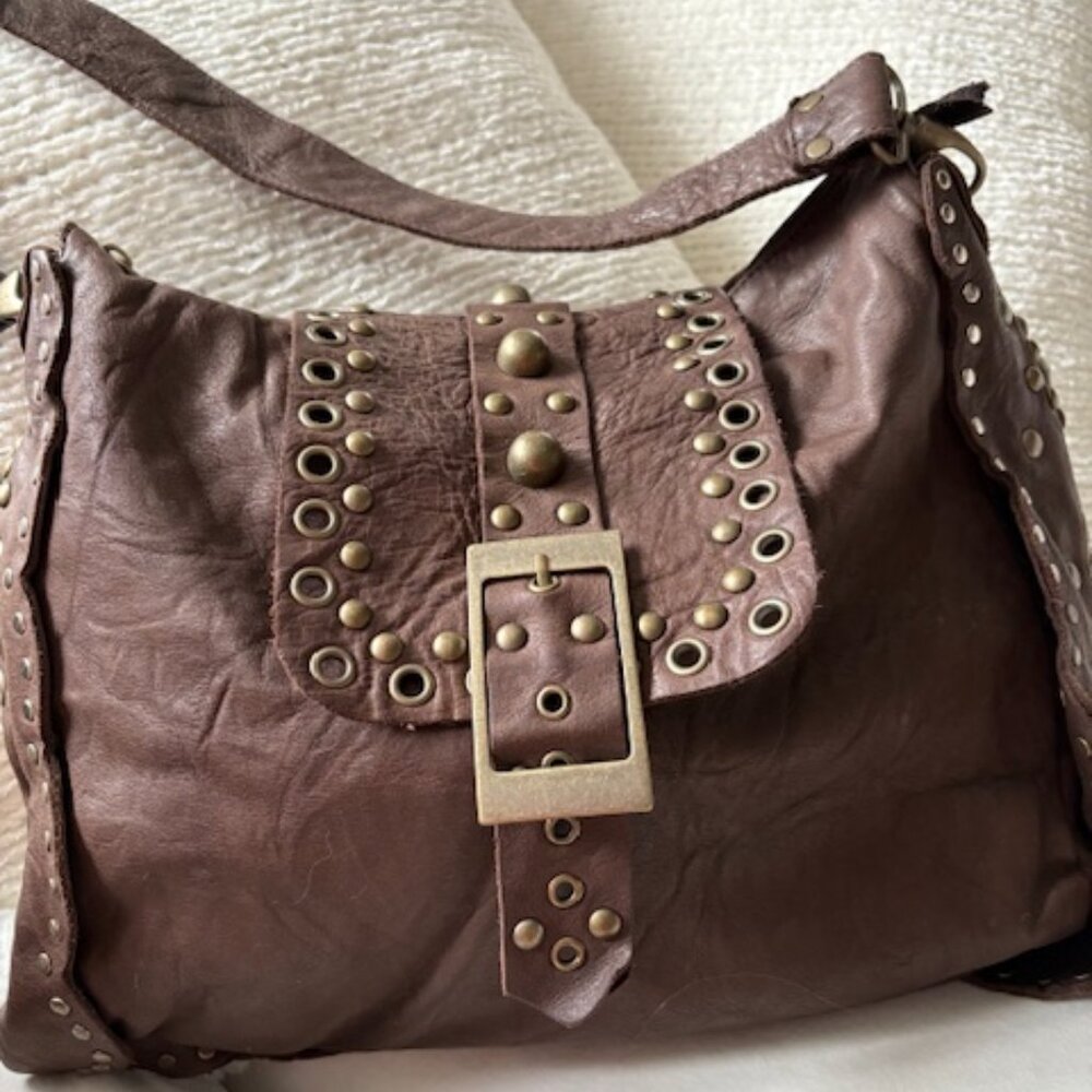 Brown heavily studded fashion handbag.